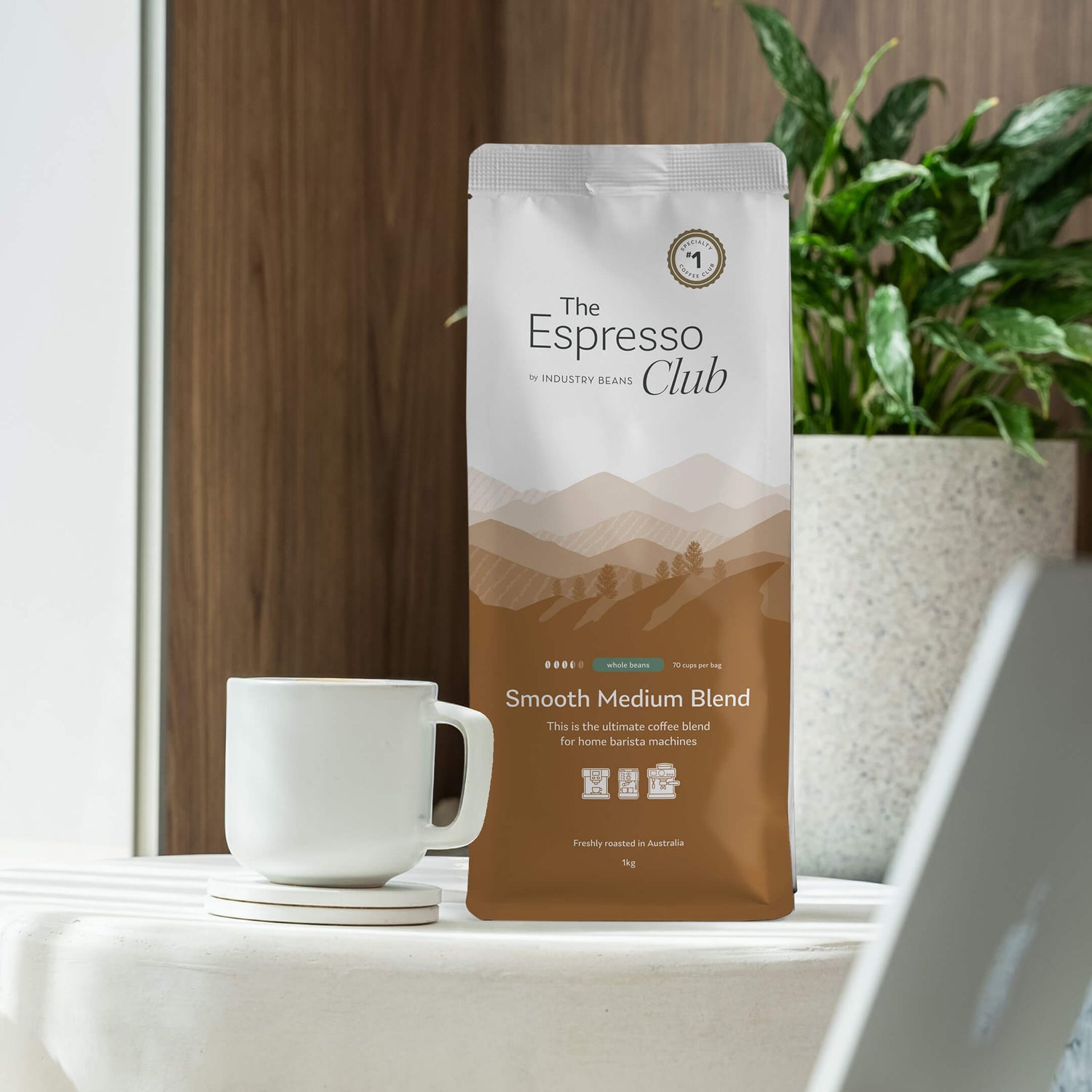 Bag of Smooth Medium Espresso Blend Next to Coffee Cup at Home
