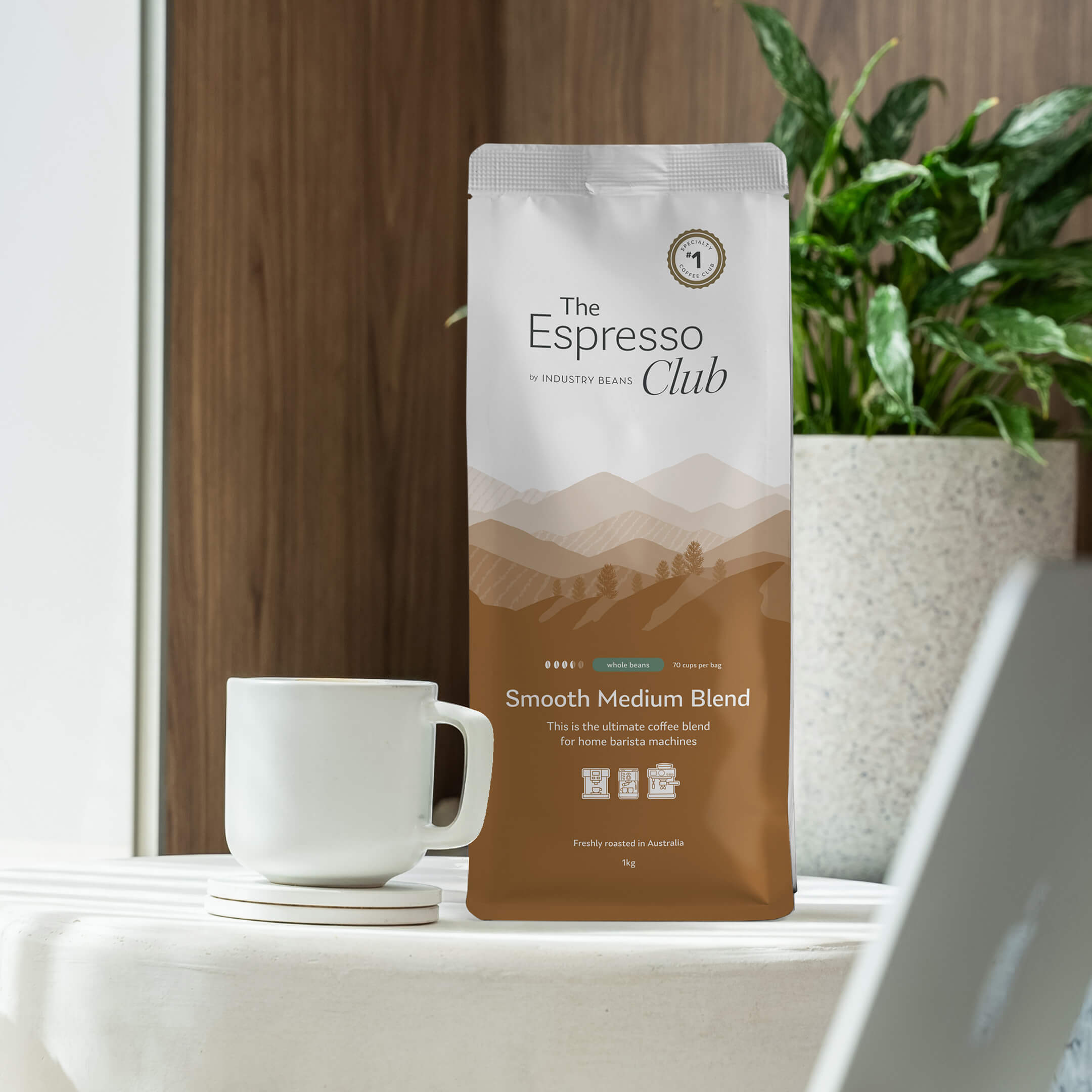 Bag of Smooth Medium Espresso Blend Next to Coffee Cup at Home